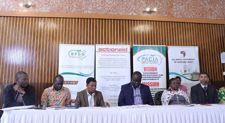 Mithika_Mwenda_-_3rd_left_reads_a_statement_by_the_CSOs_on_the_drought_situation_in_Kenya_and_horn_of_Africa
